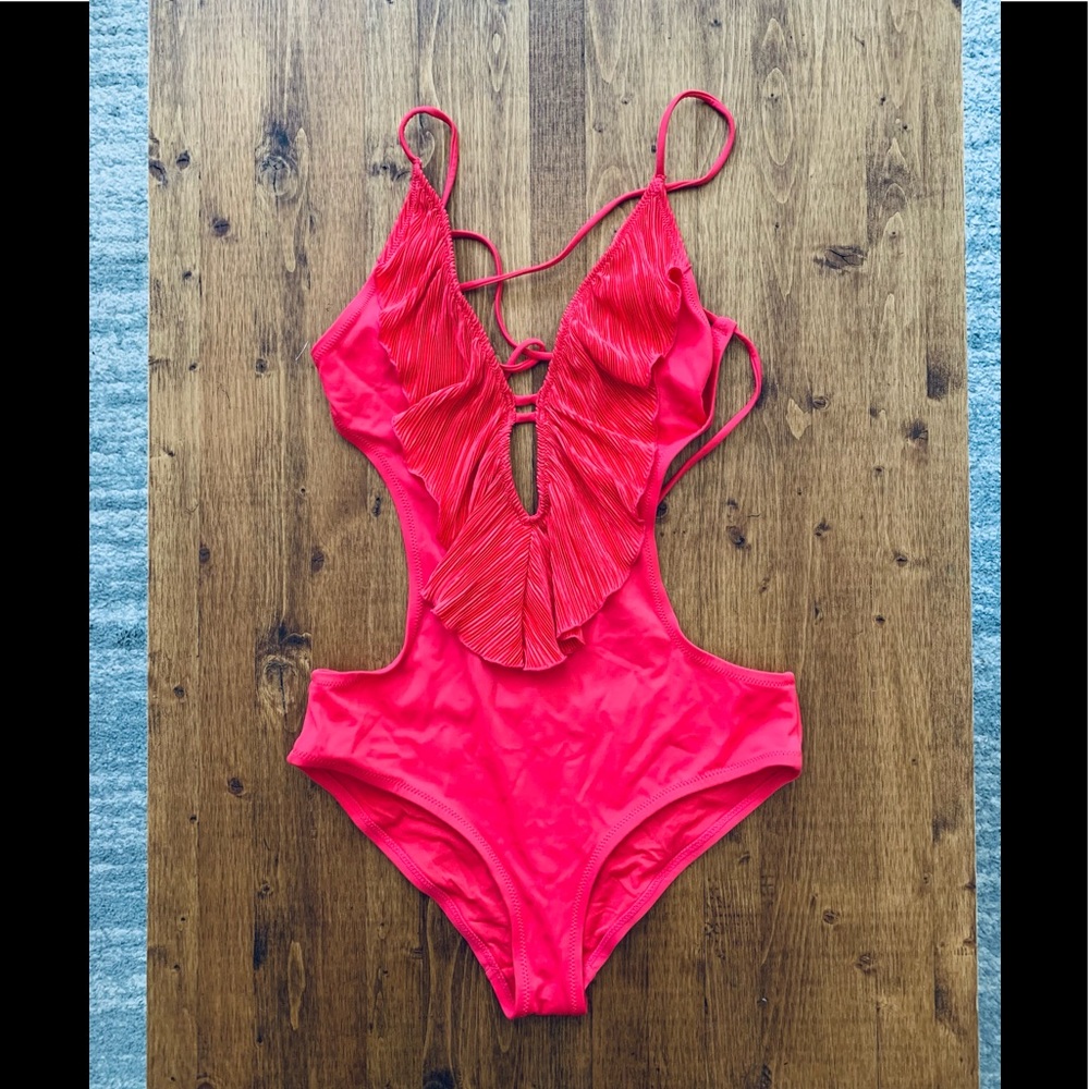 Hot pink monokini with a front ruffle and deep v